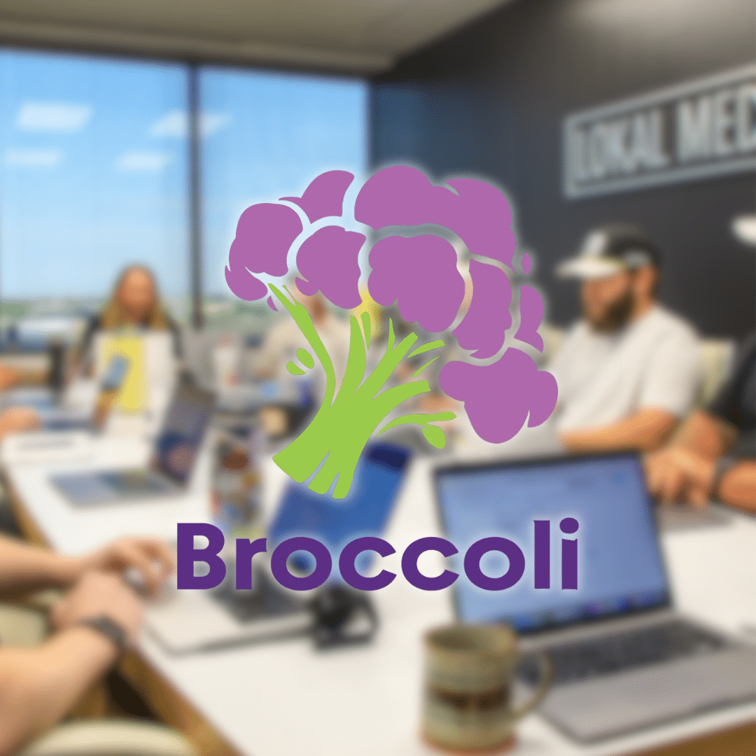 Broccoli AI logo over a photo of the Lokal Media House team working in the office